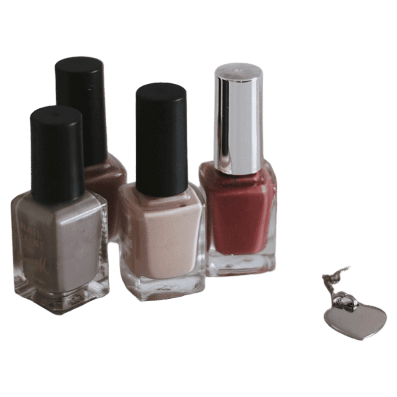 Frascos de esmalte rosa e preto